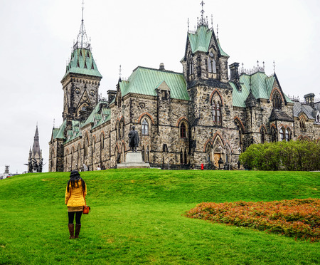 A woman visiting the Parliament Buildings in Ottawa, Canada.のeditorial素材
