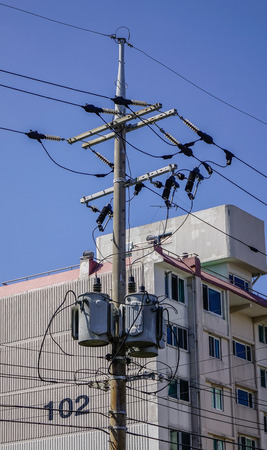 Jeju, South Korea - Sep 20, 2016. Wire electric pylon under the blue sky in Jeju Island, South Korea.のeditorial素材