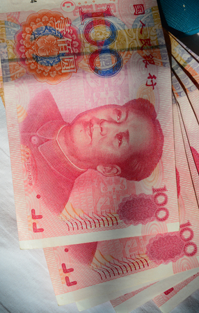 100 Renminbi (RMB) banknotes - Chinese currency. Finance concept.のeditorial素材