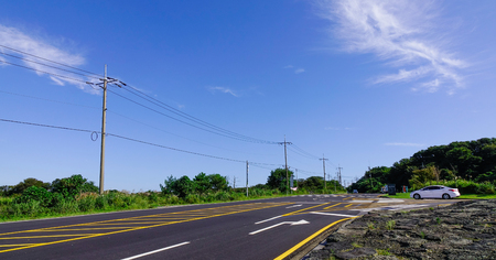 Jeju, South Korea - Sep 20, 2016. Car running on the asphalt road on Jeju Island, South Korea.のeditorial素材