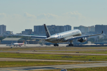 Saigon, Vietnam - Feb 19, 2019. An A350-900 airplane of Vietnam Airlines (SkyTeam Livery) landing at...