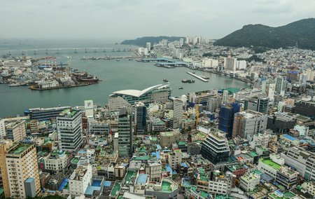Busan, South Korea - Sep 18, 2016. View of downtown on coast in Busan, S. Korea. Beautiful scenery from Busan Tower in rainy day.のeditorial素材
