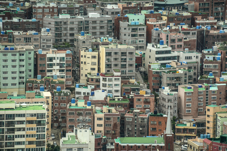 Busan, South Korea - Sep 18, 2016. View of downtown on coast in Busan, S. Korea. Beautiful scenery from Busan Tower in rainy day.のeditorial素材