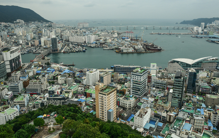 Busan, South Korea - Sep 18, 2016. View of downtown on coast in Busan, S. Korea. Beautiful scenery from Busan Tower in rainy day.のeditorial素材