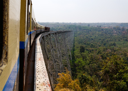 Hsipaw, Myanmar - Feb 23, 2016. Train passing the famous viaduct Goteik between Pyin Oo Lwin and Hsipaw in Shan State, Myanmar.のeditorial素材