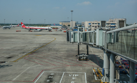 Chengdu, China - Aug 21, 2016. Passenger airplanes docking at Chengdu Shuangliu International Airport (CTU).のeditorial素材