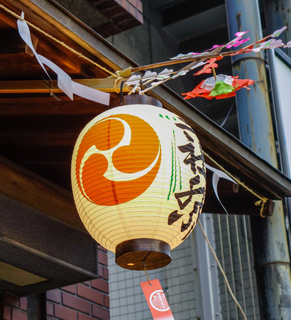 Tokyo, Japan - May 20, 2017.  A traditional paper lantern hanging on street during Mikoshi Matsuri Festival in Tokyo, Japan.のeditorial素材