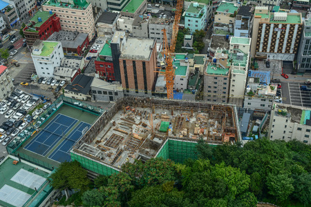 Busan, South Korea - Sep 18, 2016. View of downtown on coast in Busan, S. Korea. Beautiful scenery from Busan Tower in rainy day.のeditorial素材