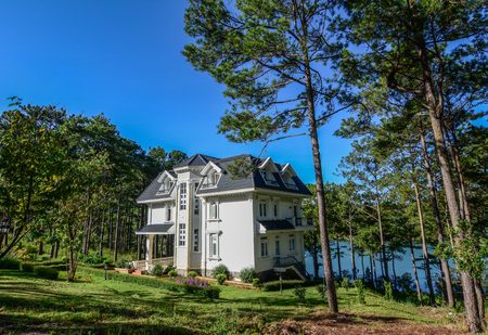 Dalat, Vietnam - Apr 5, 2015. Luxury villa with many pine trees at sunny day in Dalat, Vietnam.のeditorial素材
