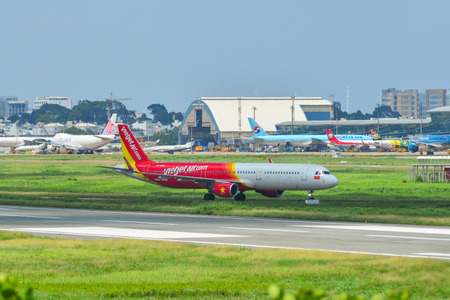 Saigon, Vietnam - Jun 19, 2019. VietJet Air VN-A634 (Airbus A321) taxiing on runway of Tan Son Nhat...
