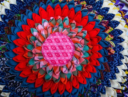Colorful textile for sale at a street market in Fenghuang Ancient Town, China.