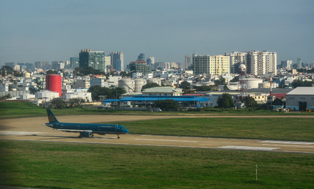 Saigon, Vietnam - Nov 10, 2015. Passenger airplanes docking at Tan Son Nhat Airport in Saigon, Vietnam.のeditorial素材