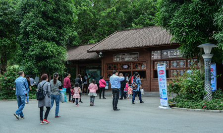 Nanning, China - Nov 1, 2015. Visitors waiting at the ticket booth of botanic garden in Nanning, China.のeditorial素材