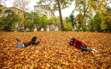 Saint Petersburg, Russia - Oct 4, 2016. People enjoying at autumn park in Saint Petersburg, Russia.のeditorial素材