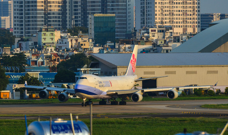Saigon, Vietnam - Jul 10, 2019. B-18707 China Airlines Boeing 747-400F taxiing on runway of Tan Son Nhat Airport (SGN) in Saigon, Vietnam.のeditorial素材