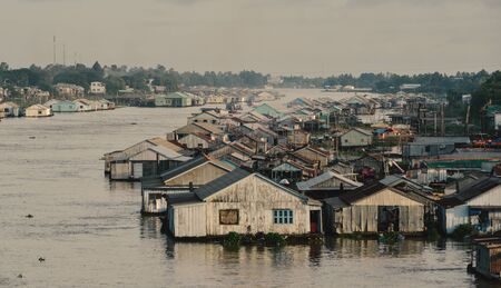 Floating houses on Mekong River in Chau Doc, Vietnam. Chau Doc is a city in the heart of the Mekong Delta, in Vietnam.の写真素材