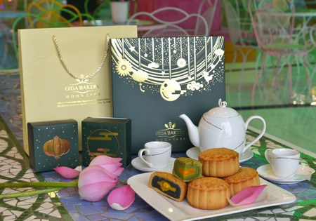 Saigon, Vietnam - Aug 6, 2019. Tasty moon cake with the box for sale at the supermarket in Saigon (Ho Chi Minh City), Vietnam.のeditorial素材