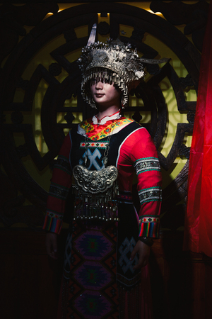 Nanning, China - Nov 2, 2015. Traditional dress for display at the museum in Nanning, China. Nanning is a city in southern China near the Vietnam border.のeditorial素材