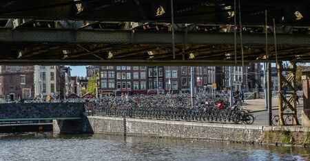 Amsterdam, Holland - Oct 7, 2018. Canals of the Amsterdam city. The historical canals of the city surrounded by traditional Dutch houses is main attractions of Amsterdam.の写真素材