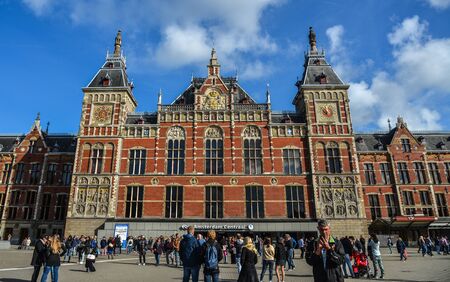 Amsterdam, Holland - Oct 7, 2018. Old buildings of Amsterdam, Holland. Amsterdam is best known for its luxurious canal houses and charming gabled facades.の写真素材