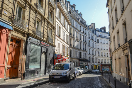Paris, France - Oct 4, 2018. Beautiful old street in Montmartre district in Paris, France. Montmartre is a large hill in Paris 18th arrondissement.のeditorial素材