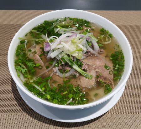 Traditional Vietnamese noodle soups (Pho Bo) in local restaurant. Pho was listed on World 50 Most Delicious Foods compiled by CNN Go.の写真素材