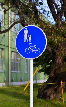 Traffic sign for bicycle and pedestrian on street in Gifu, Japan.