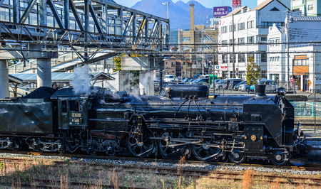 Gunma, Japan - Nov 9, 2019. The C61 steam locomotive (Joyful Train) running on the track in Gunma, Japan. The train was constructed with a boiler after World War II.のeditorial素材