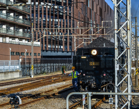 Gunma, Japan - Nov 9, 2019. The C61 steam locomotive (Joyful Train) running on the track in Gunma, Japan. The train was constructed with a boiler after World War II.のeditorial素材