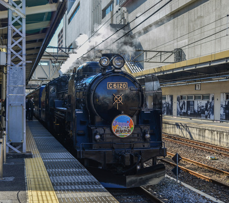 Gunma, Japan - Nov 9, 2019. The C61 steam locomotive (Joyful Train) running on the track in Gunma, Japan. The train was constructed with a boiler after World War II.のeditorial素材