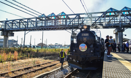 Gunma, Japan - Nov 9, 2019. The C61 steam locomotive (Joyful Train) running on the track in Gunma,...