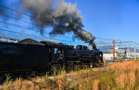 Gunma, Japan - Nov 9, 2019. The C61 steam locomotive (Joyful Train) running on the track in Gunma, Japan. The train was constructed with a boiler after World War II.のeditorial素材