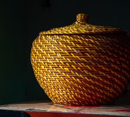 Traditional bamboo basket at rural house in Northern Vietnam.の写真素材