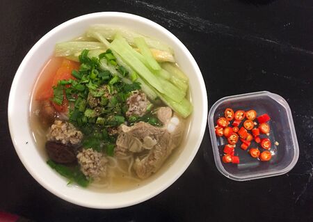 Hanoi traditional noodle (Bun Doc Mung) on the table for lunch.