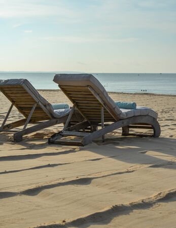 Relaxing chairs at the seaside luxury resort in Mui Ne Town, Phan Thiet, Vietnam.の写真素材