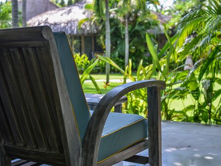 Wooden relaxing chairs at eco resort in Phan Thiet, Vietnam.の写真素材