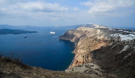 Beautiful seascape on Santorini island, Greece. Summer landscape, turquoise sea and blue sky.の写真素材