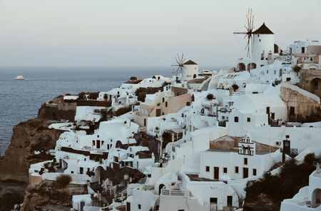 Beautiful sunrise on Santorini Island, Greece. Santorini is one of the most popular islands for destination weddings and honeymoons.の写真素材