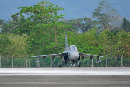 Langkawi, Malaysia - Mar 29, 2019. India Air Fore HAL Tejas fighter jet taxiing on runway of the Langkawi Airport (LGK).のeditorial素材