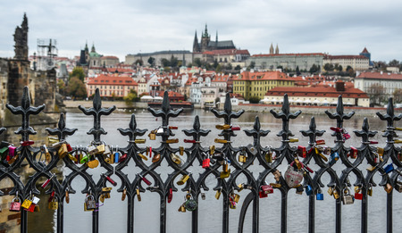 Prague, Czech - Oct 26, 2018. Love locks hung along Vltava River, next to the Charles Bridge in Prague (Praha), Czech.のeditorial素材