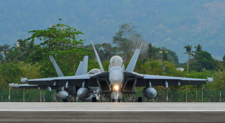 Langkawi, Malaysia - Apr 1, 2019. Electronic warfare aircraft EA-18G Growler of United States Navy taxiing on runway of Langkawi Airport (LGK).のeditorial素材