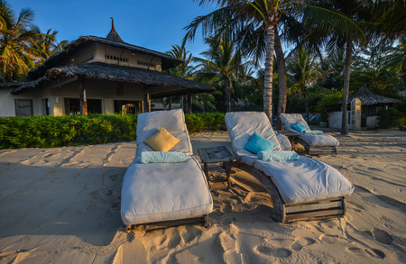 Relaxing chairs at the seaside luxury resort in Mui Ne Town, Phan Thiet, Vietnam.のeditorial素材
