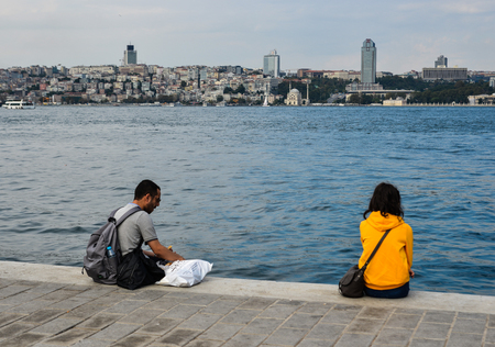 Istanbul, Turkey - Sep 28, 2018. People relaxing on promenade of Bosphorus Strait. Bosphorus is an internationally significant waterway located in northwestern Turkey.のeditorial素材
