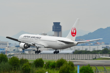 Osaka, Japan - Jun 26, 2019.  JA613J Japan Airlines Boeing 767-300ER landing at Osaka Itami Airport (ITM). Itami is the main domestic airport serving Kansai region.のeditorial素材
