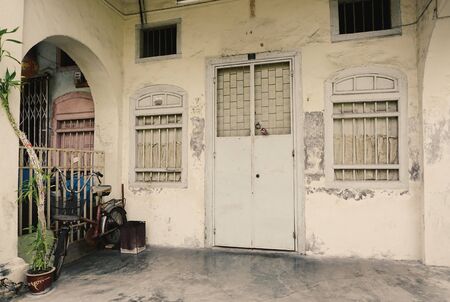 Old house located in George Town, Penang, Malaysia. Penang embraces modernity while retaining its traditions and old world charm.の写真素材