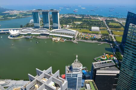 Singapore - Feb 9, 2018. Aerial view over Singapore from Marina Bay Sands rooftop. Singapore economy is known as one of the freest and most innovative.のeditorial素材