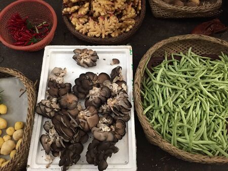 Fresh vegetables and fruits at local market in Hunan, China.