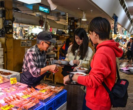 Aomori, Japan - Nov 4, 2019. Local people, tourists and travelers buying food at Furukawa Fish Market in Aomori, Japan.のeditorial素材