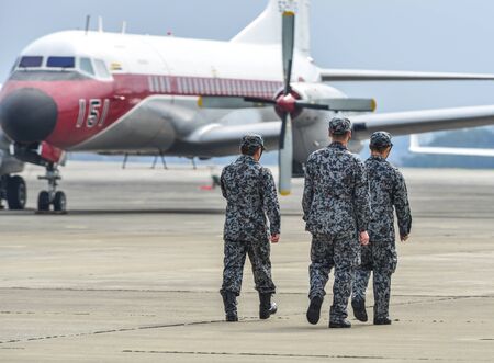 Saitama, Japan - Nov 3, 2019. Air crew of Japan Air Self Defense Force (JASDF) working at airfield of Iruma Air Base (RJTJ) in Saitama Prefecture, north of western Tokyo, Japan.のeditorial素材