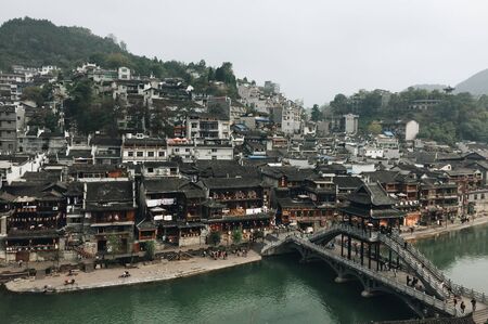 Hunan, China - Nov 6, 2015. View of Fenghuang Old Town in Hunan, China. The ancient town was added to the UNESCO World Heritage in 2008.のeditorial素材